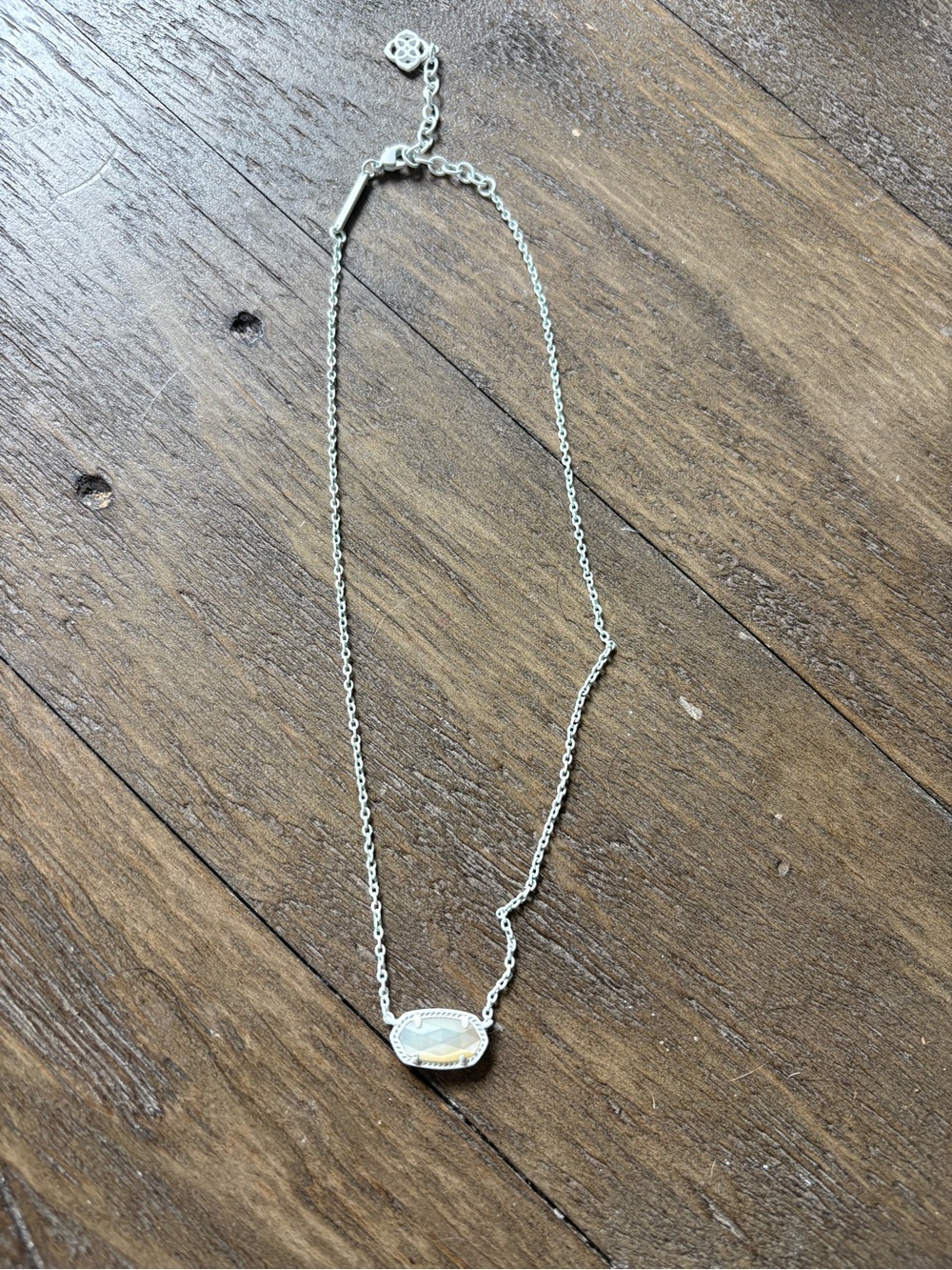 Kendra Scott Elisa Pendant Necklace with white chain and Clear Oval Stone
